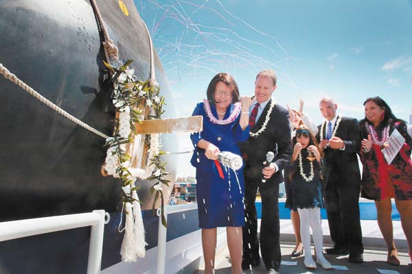 Wife of late senator christens Navy warship bearing his name | News ...